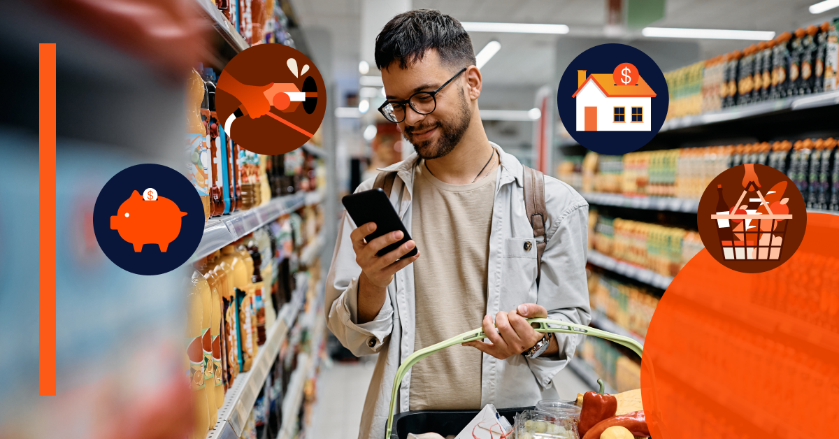 A man in a grocery store looks at his phone while holding a shopping basket, with icons of a piggy bank, home, and food basket overlaid around him.